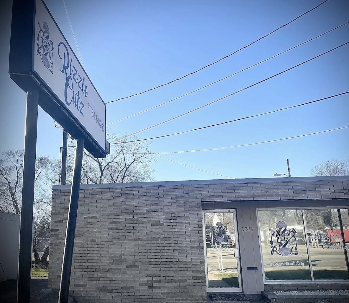 Rizzle Cutz barbershop exterior 3314 S Cedar St Lansing MI